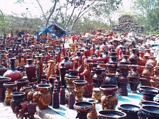 Photo of workshop ans sell hand crafted designer clay pots and idols