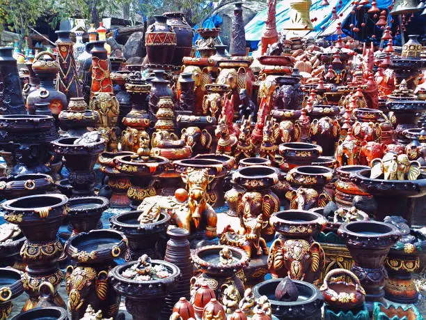 Photo of workshop ans sell hand crafted designer clay pots and idols