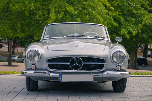 Stuttgart, Germany - August 2, 2020: Front view of a Mercedes-Benz 190 SL cabrio german oldtimer car at the Cars & Coffee event at the Mercedes-Benz Museum.