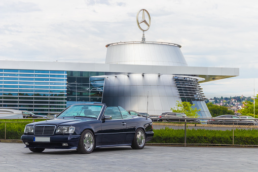 Stuttgart, Germany - August 2, 2020: Mercedes-Benz E 320 cabrio german oldtimer car at the Cars & Coffee event at the Mercedes-Benz Museum.
