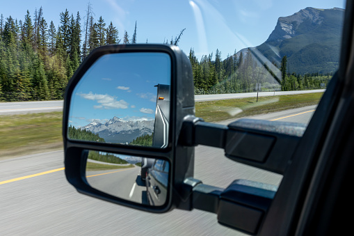 POV Video of Car driving on Empty Road Towards Moraine Lake in Banff National Park, Canada