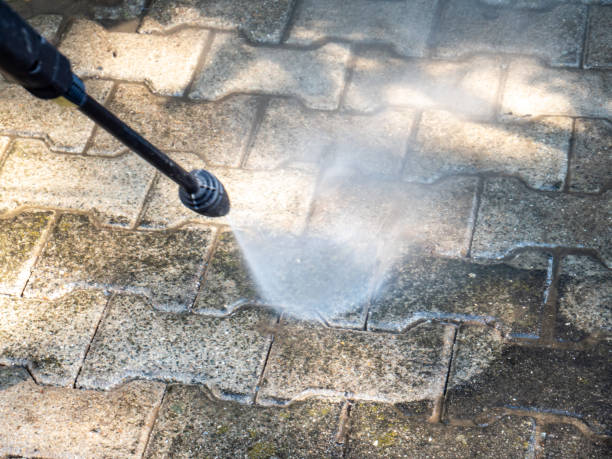 old cleaning the terrace with high pressure cleaner - paving stone cobblestone road old imagens e fotografias de stock