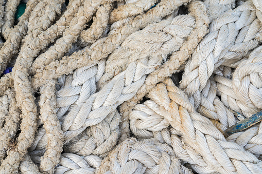 Entangled fishing nets. Background of ropes