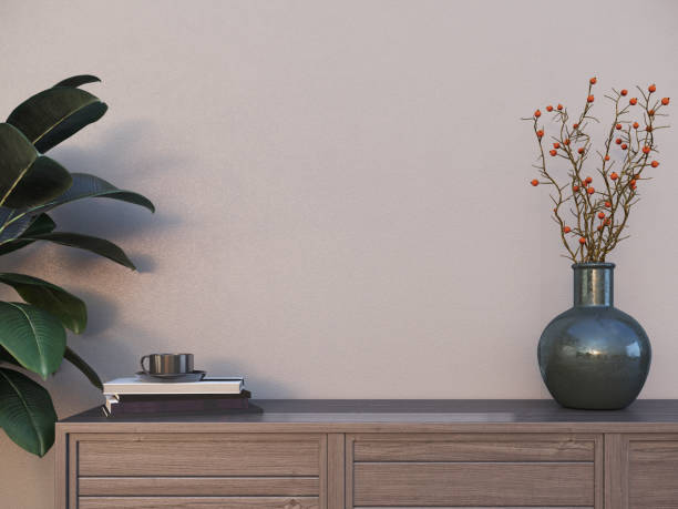 istock Empty interior background, vase on cabinet and plant. 1264841137
