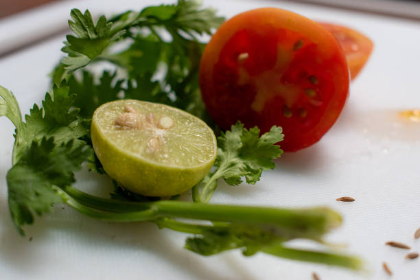 vintage style old salad with vegetables ingredients isolated on a plate.