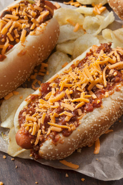 istock Chili and Cheese Hotdog with Potato Chips 1264844333