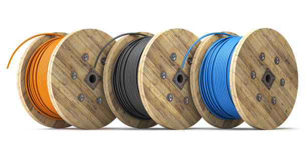 Wire electric cable of different colors on wooden coil or spool isolated on white background. Wire electric cable of different colors on wooden coil or spool isolated on white background. 3d illustration wooden spool stock pictures, royalty-free photos & images