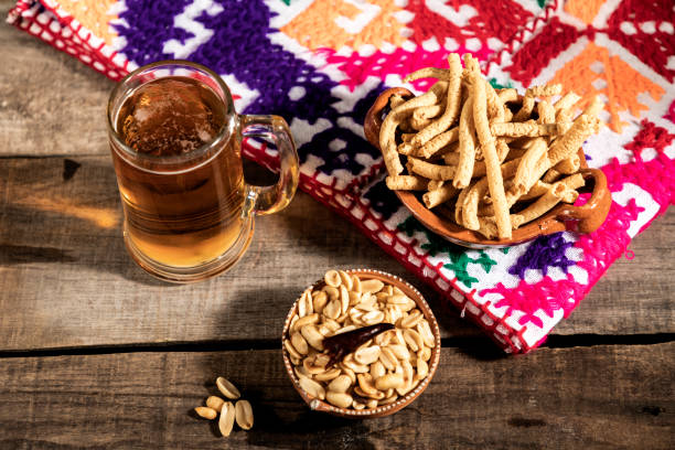 istock Beer jar with delicious Mexican snacks 1264844435