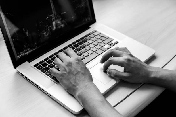 istock Man doing home office on his laptop from a hotel room. 1264845278