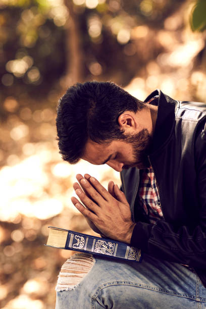 istock Spiritual man doing day prayer in the forest. 1264845296