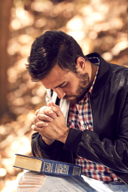 istock Spiritual man doing day prayer in the forest. 1264845316