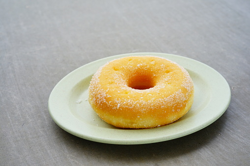 A sugar donut with Breakfast
