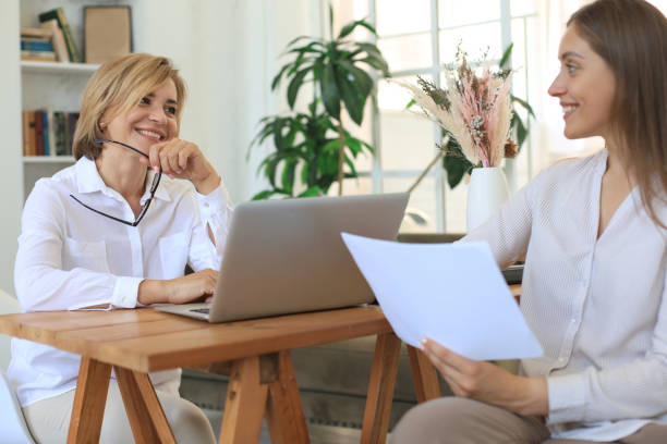 istock Professional middle aged female psychologist conducting a consultation. 1264845733