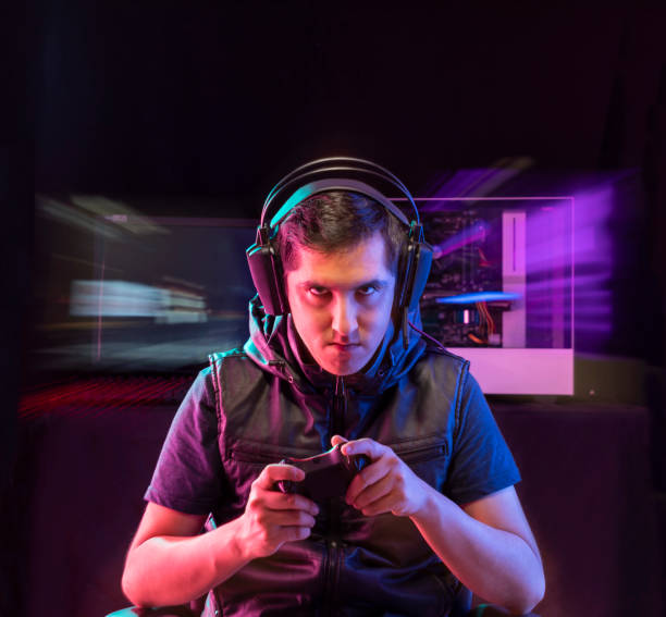 istock Young man playing videogames with different facial expressions 1264846109