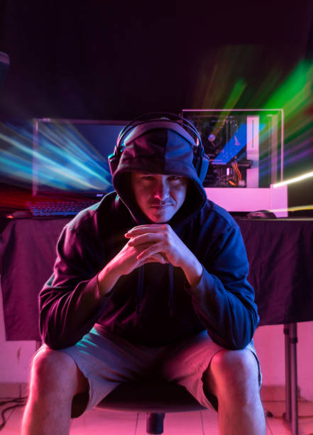 Young man playing videogames with different facial expressions