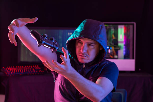 istock Young man playing videogames with different facial expressions 1264846736