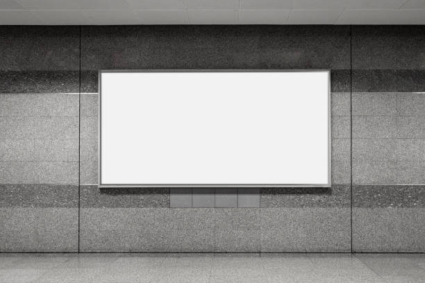 istock Blank Large Advertising Board placed on urban public granite wall 1264847984