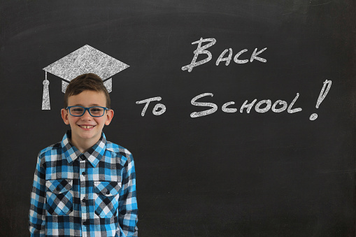 Education back to school boy child blackboard