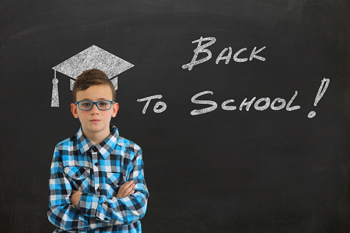 Education back to school boy child blackboard