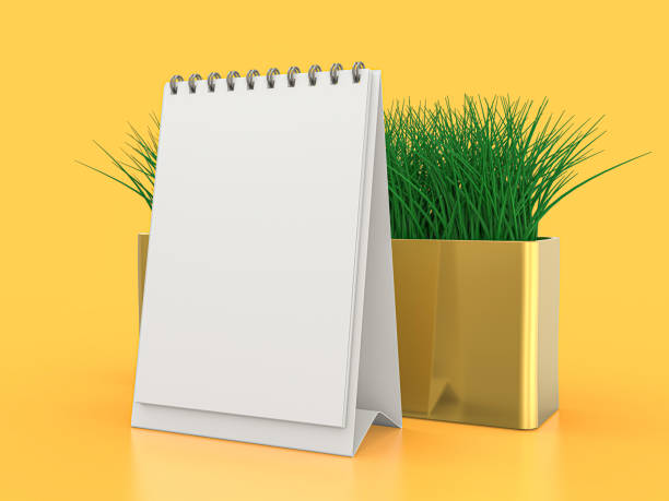 istock Desk blank calendar mockup on yellow background. 3D illustration 1264852203