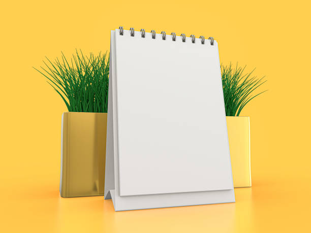 istock Desk blank calendar mockup on yellow background. 3D illustration 1264852206