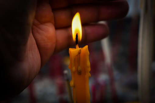 Light a candle to worship is the belief of Buddhism.