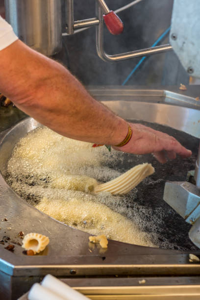 istock Hands working preparing food to serve 1264854545