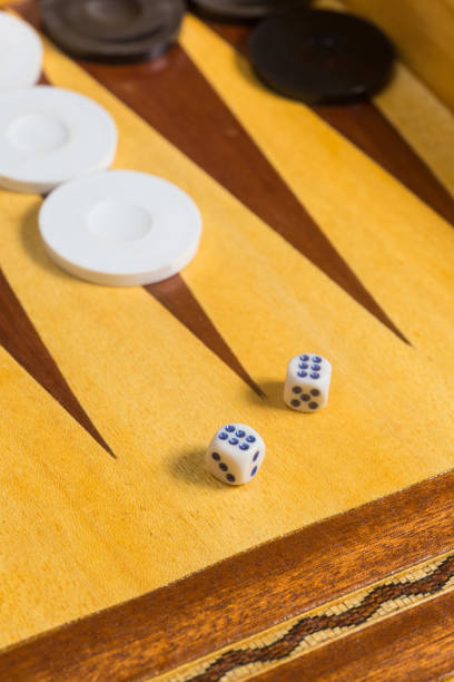 istock closeup of  dice on a backgammon (tawla) wooden board 1264861756