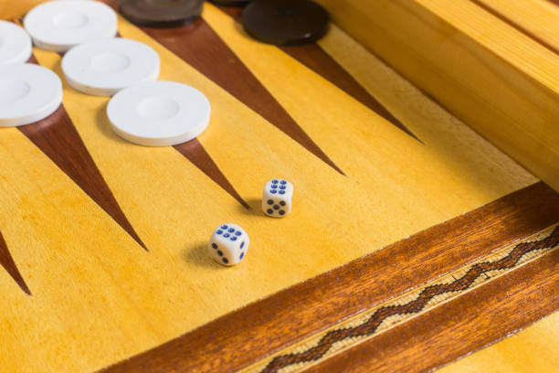 istock closeup of  dice on a backgammon (tawla) wooden board 1264861759