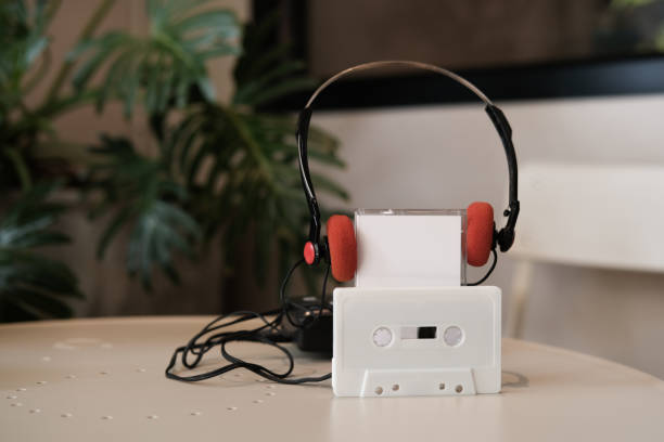 istock White cassette tape with red vintage headphones 1264863699