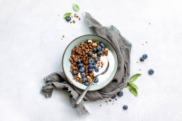 Granola and blueberry breakfast with plain yogurt
