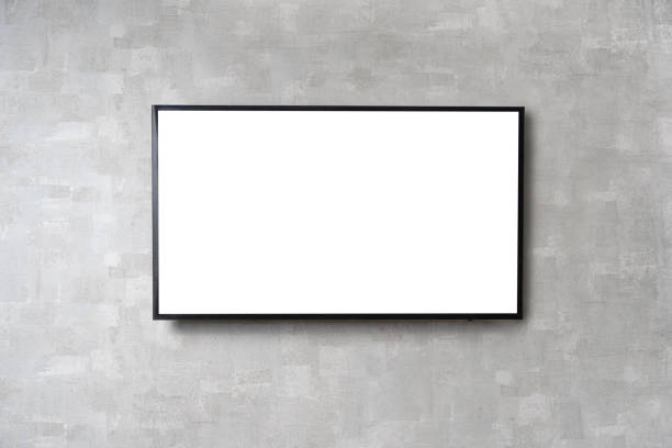 istock TV mockup background with lcd tv with flat white screen fixed on a wall 1264864110