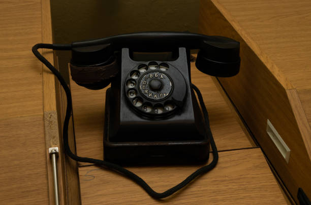 istock Black Russian made phone on brown wood, retro 1264867059