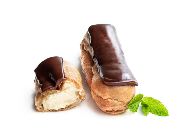Chocolate éclair isolated on white background Chocolate éclair isolated on white background choux pastry photos stock pictures, royalty-free photos & images