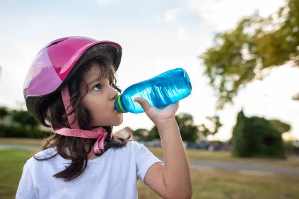 Photo of girl drinking water.