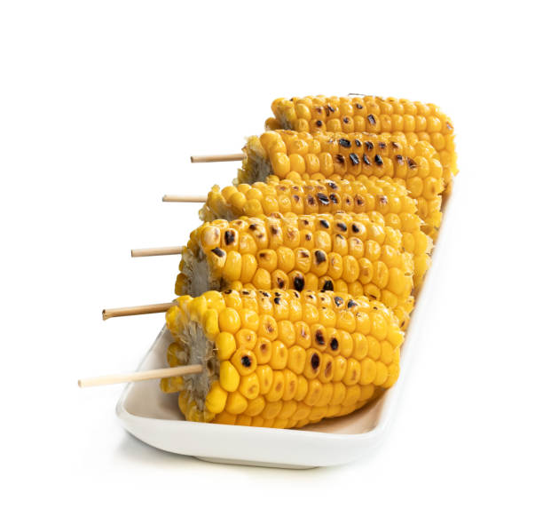 istock Grilled sweet corn on the cob isolated on white 1264870945