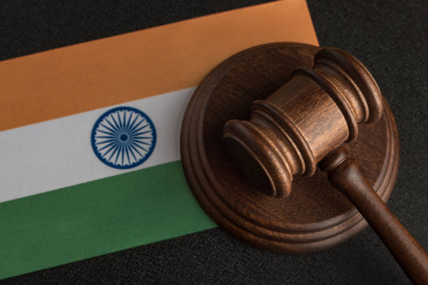 Judge Gavel and flag of India . Violation of human rights. Law and justice Judge Gavel and flag of India . Violation of human rights. Law and justice. lawsuit settlement stock pictures, royalty-free photos & images