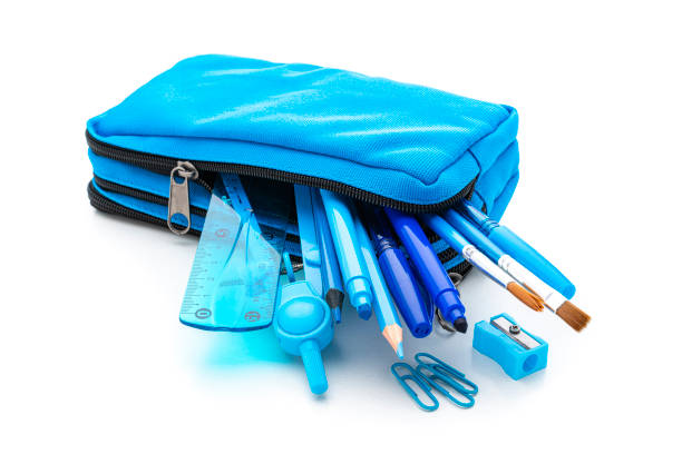 istock Blue pencil case with school supplies isolated on white background. 1264872088