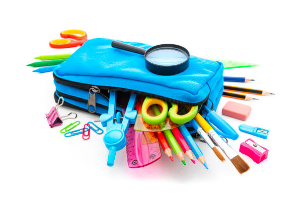 istock Pencil case with multicolored school supplies isolated on white background. 1264872633