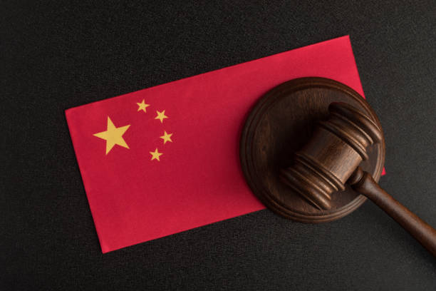 Judges hammer and the flag of China. Law and Justice. Constitutional law Judges hammer and the flag of China. Law and Justice. Constitutional law. prc stock pictures, royalty-free photos & images