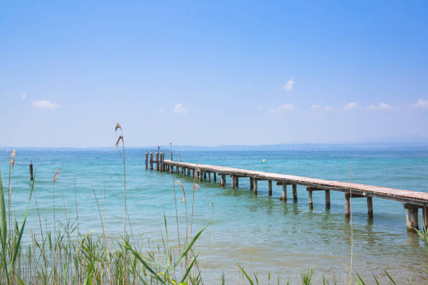 istock beach at lazise, lake garda, Italy 1264874104
