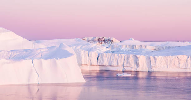 istock Climate Change - Iceberg and ice from glacier in arctic nature on Greenland 1264876268