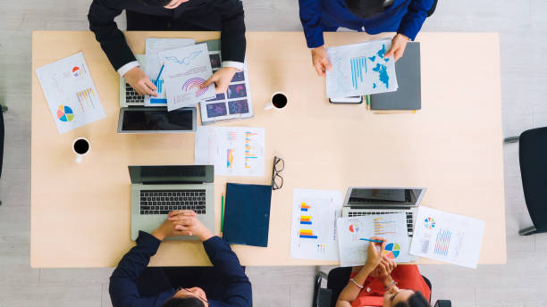 istock Business people group meeting shot from top view 1264877060