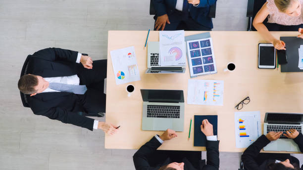 istock Business people group meeting shot from top view 1264877197