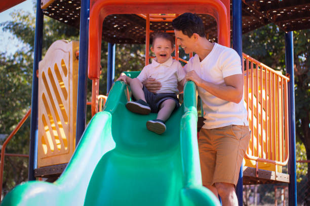 istock Father and son in a publick park. 1264882019
