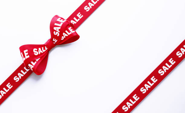 istock Sale Written Red Tied Bow over White Background 1264885135