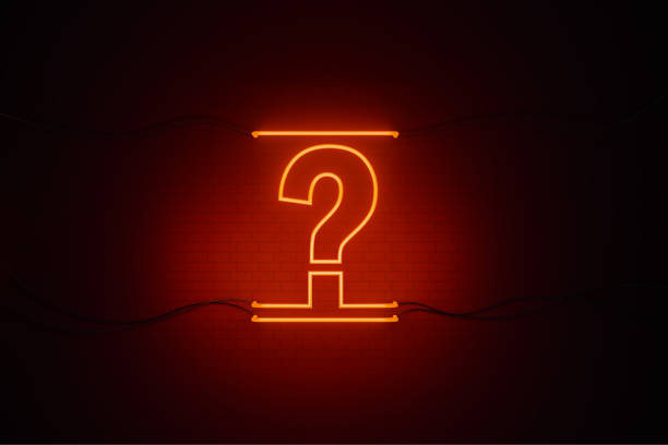istock Question Mark Drawn by Red Neon Light on Black Wall - Q and A Concept 1264886261