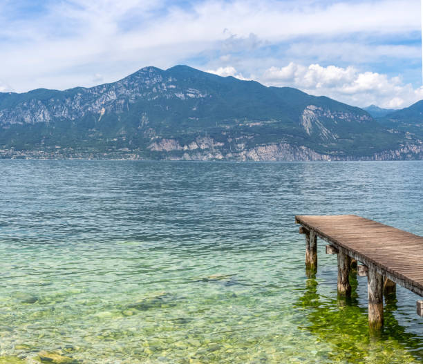 istock panorama bridge/path at lazise, lake garda, Italy 1264888881
