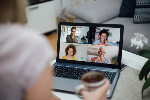 istock Business people having a video conference together 1264894835