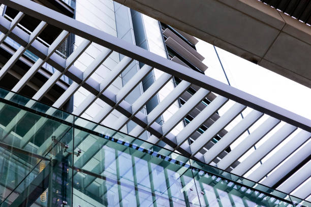 istock Low angle view of office buildings, view through pedestrian sunshade, copy space 1264897822